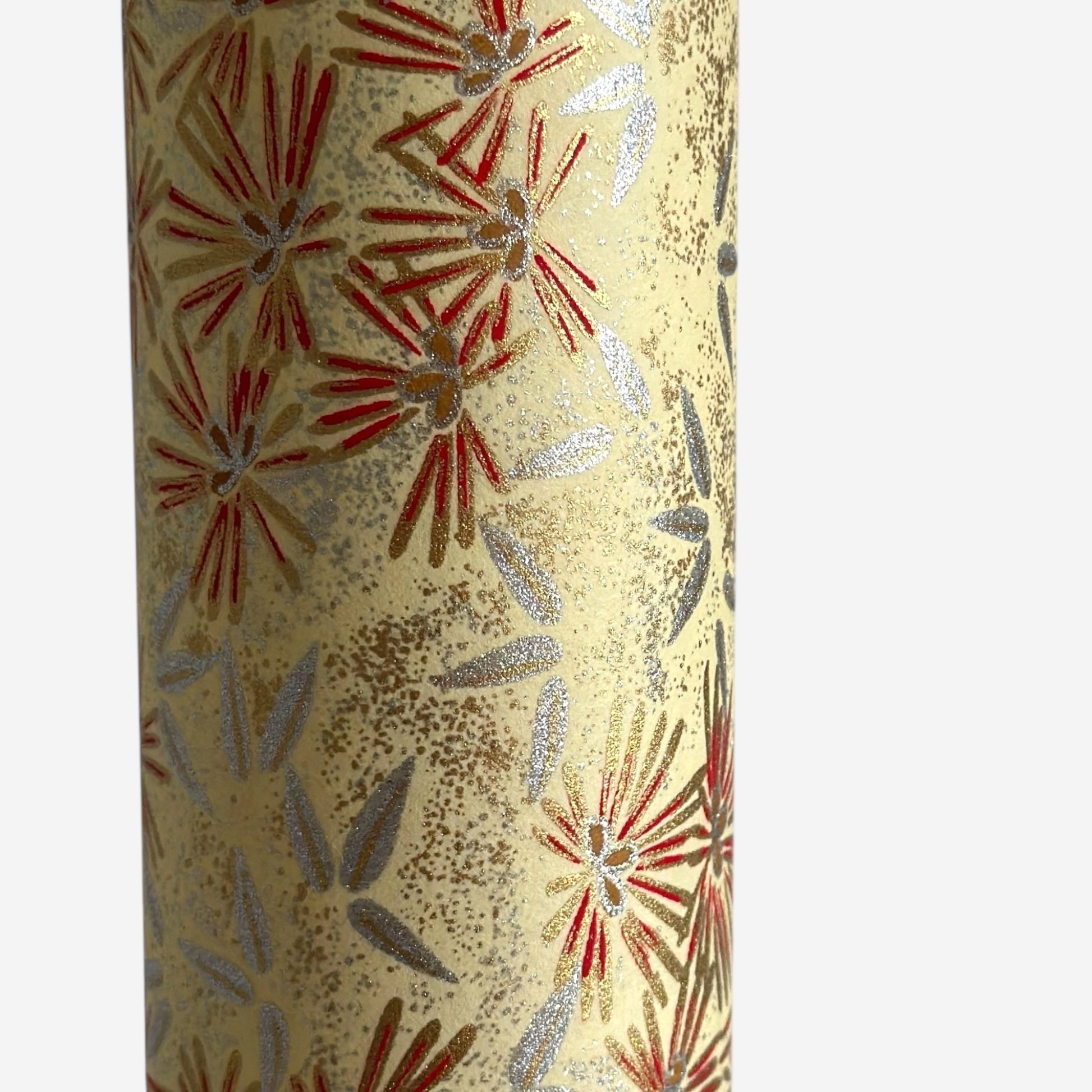 Pattern of scattered pine needles (matsuba) in gold and silver on a cream backdrop. Japanese chiyogami paper.