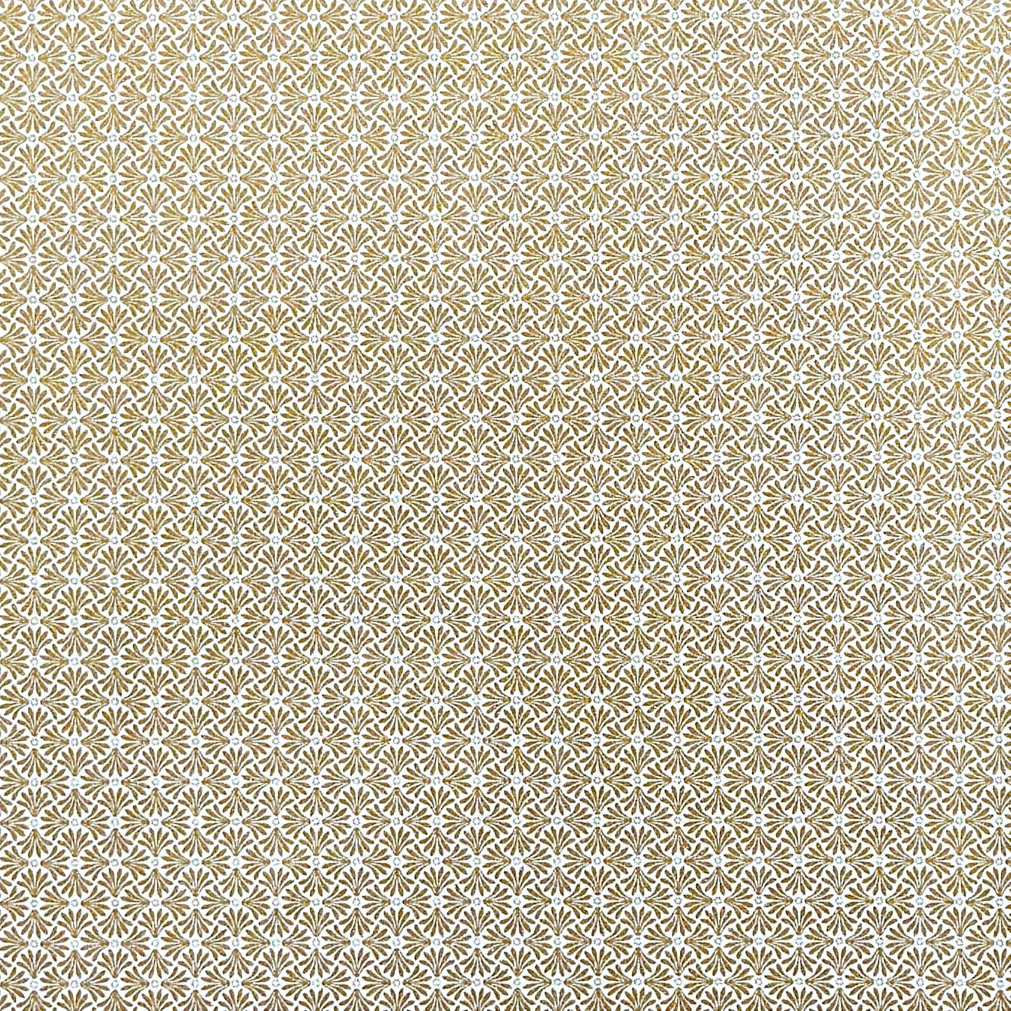 a sheet of Japanese silkscreen printed chiyogami yuzen paper with a micro gold geometric pattern on white backdrop. 