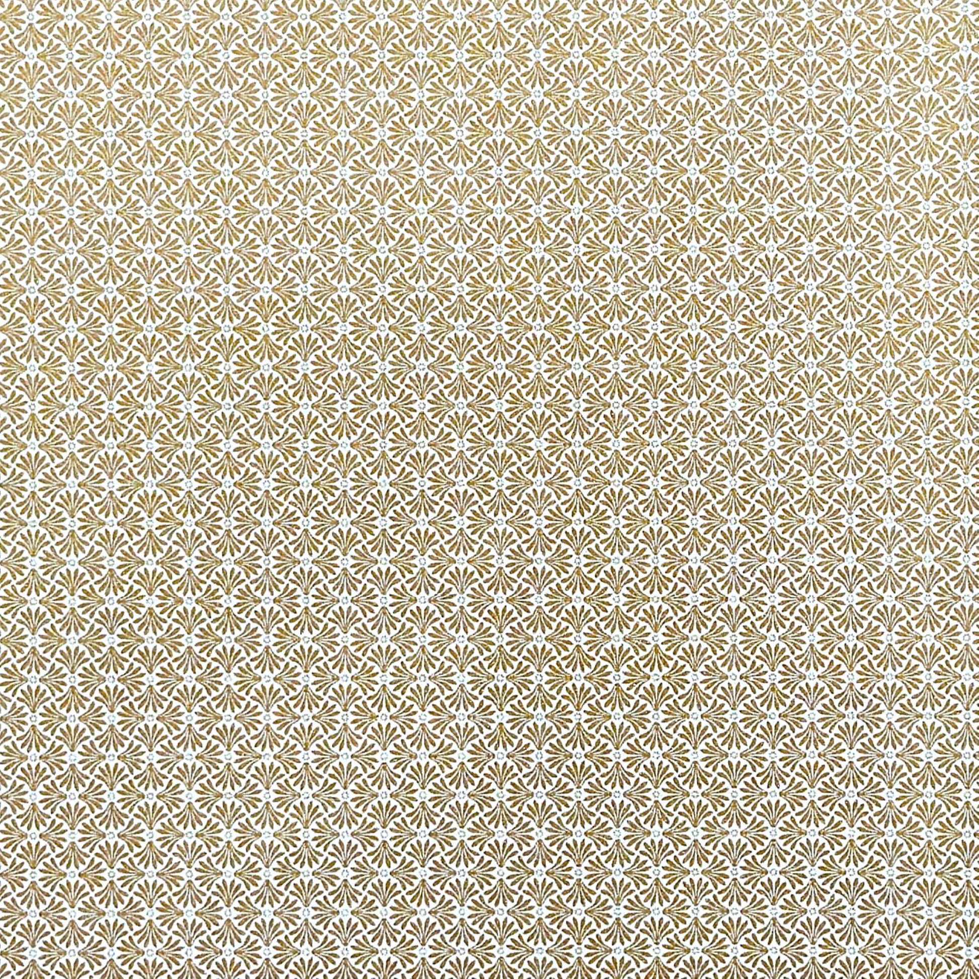 a sheet of Japanese silkscreen printed chiyogami yuzen paper with a micro gold geometric pattern on white backdrop. 