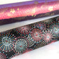 Colourful fireworks (hanabi) on a black background. Japanese chiyogami paper. Rolled