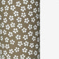 a sheet of chiyogami paper with a mocha brown background and little white stylised cherry blossom flowers