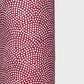 a sheet of Japanese chiyogami paper with an aubergine background and a small repeat pattern of tiny white dots in an arch shape