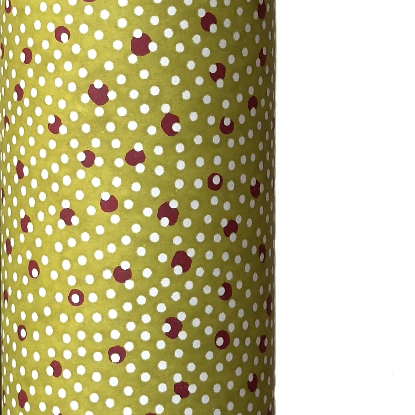 a sheet of Japanese chiyogami paper with an olive backdrop and a white dotted repeat arch pattern with red dots