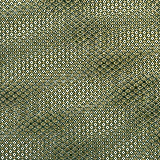 a sheet of Japanese silkscreen printed chiyogami paper with a mini geometric design in gold on green backdrop 