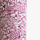 a sheet of Japanese silkscreen printed chiyogami yuzen paper with a micro floral pattern in aubergine, white and black. Close up