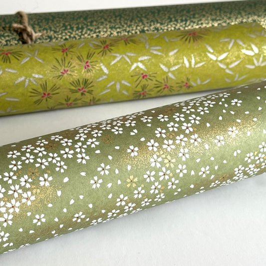 Waves of dainty white and gold flowers on a sage backdrop. Japanese chiyogami paper