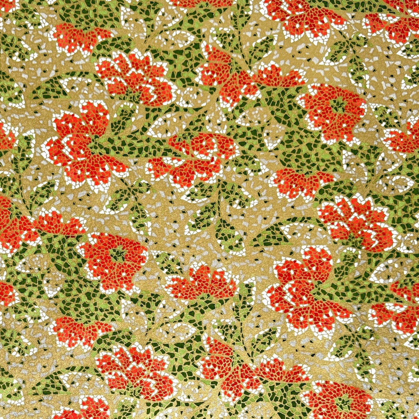 Japanese silkscreen chiyogami paper with a mosaic pattern of scarlet chrysanthemums on gold with green foliage.