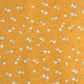 Pale blue plum (ume) blossom with a rich saffron backdrop.  Japanese chiyogami paper.
