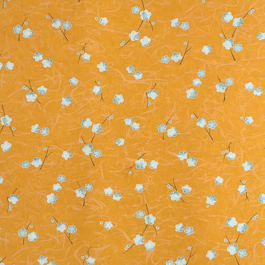 Pale blue plum (ume) blossom with a rich saffron backdrop.  Japanese chiyogami paper.