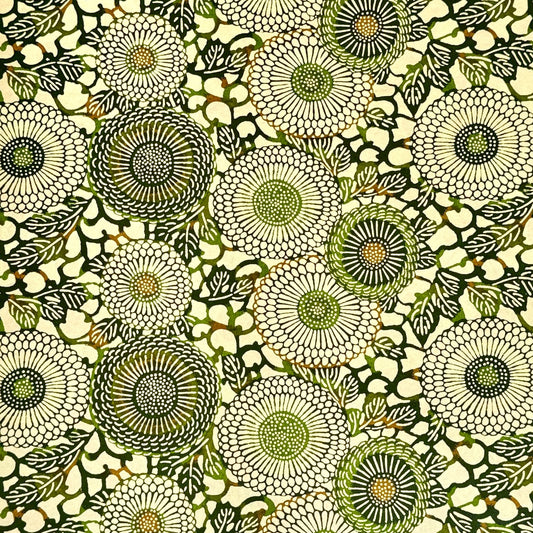 Japanese silkscreen chiyogami paper with a repeat pattern of stylised chrysanthemum flowers in tones of deep green on a buttermilk cream backdrop.