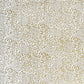 Japanese silkscreen chiyogami paper with an intricate floral pattern in gold on ivory white.