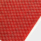 Japanese silkscreen chiyogami paper with a two-tone rich red geometric pattern on creamy white