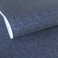 a sheet of indigo Japanese chiyogami paper with tiny white polka dots