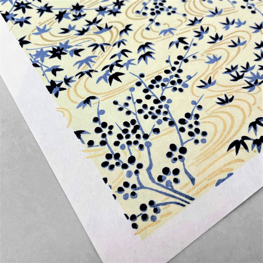 japanese silk-screen handmade paper showing gold rivers and blue falling leaves and foliage