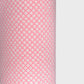 a sheet of chiyogami paper with a pink background and little irregular white dots with a gold center