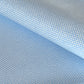 a sheet of chiyogami paper with a sky blue background and little irregular white dots with a silver centre