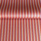 Japanese silkscreen chiyogami paper with a classic narrow stripe pattern in berry tones of red, pink, purple and gold.