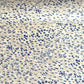japanese silk-screen handmade paper showing gold rivers and blue falling leaves and foliage