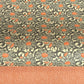 japanese silk-screen handmade paper showing grey and orange peony flower repeat pattern