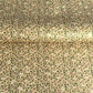 Japanese chiyogami silkscreen paper with a dainty floral pattern on a creamy backdrop and finished with gold metallic ink. 