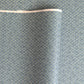 Japanese silkscreen chiyogami paper with a two-tone sky blue geometric pattern on creamy white