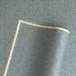 Japanese silkscreen chiyogami paper with a two-tone sky blue geometric pattern on creamy white