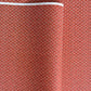Japanese silkscreen chiyogami paper with a two-tone rich red geometric pattern on creamy white