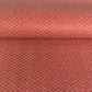 Japanese silkscreen chiyogami paper with a two-tone rich red geometric pattern on creamy white
