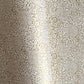 Japanese silkscreen chiyogami paper with an intricate floral pattern in gold on ivory white.