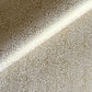 Japanese silkscreen chiyogami paper with an intricate floral pattern in gold on ivory white.