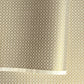 a sheet of Japanese silkscreen printed chiyogami yuzen paper with a micro gold geometric pattern on white backdrop. 