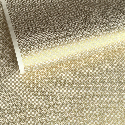 a sheet of Japanese silkscreen printed chiyogami yuzen paper with a micro gold geometric pattern on white backdrop. 