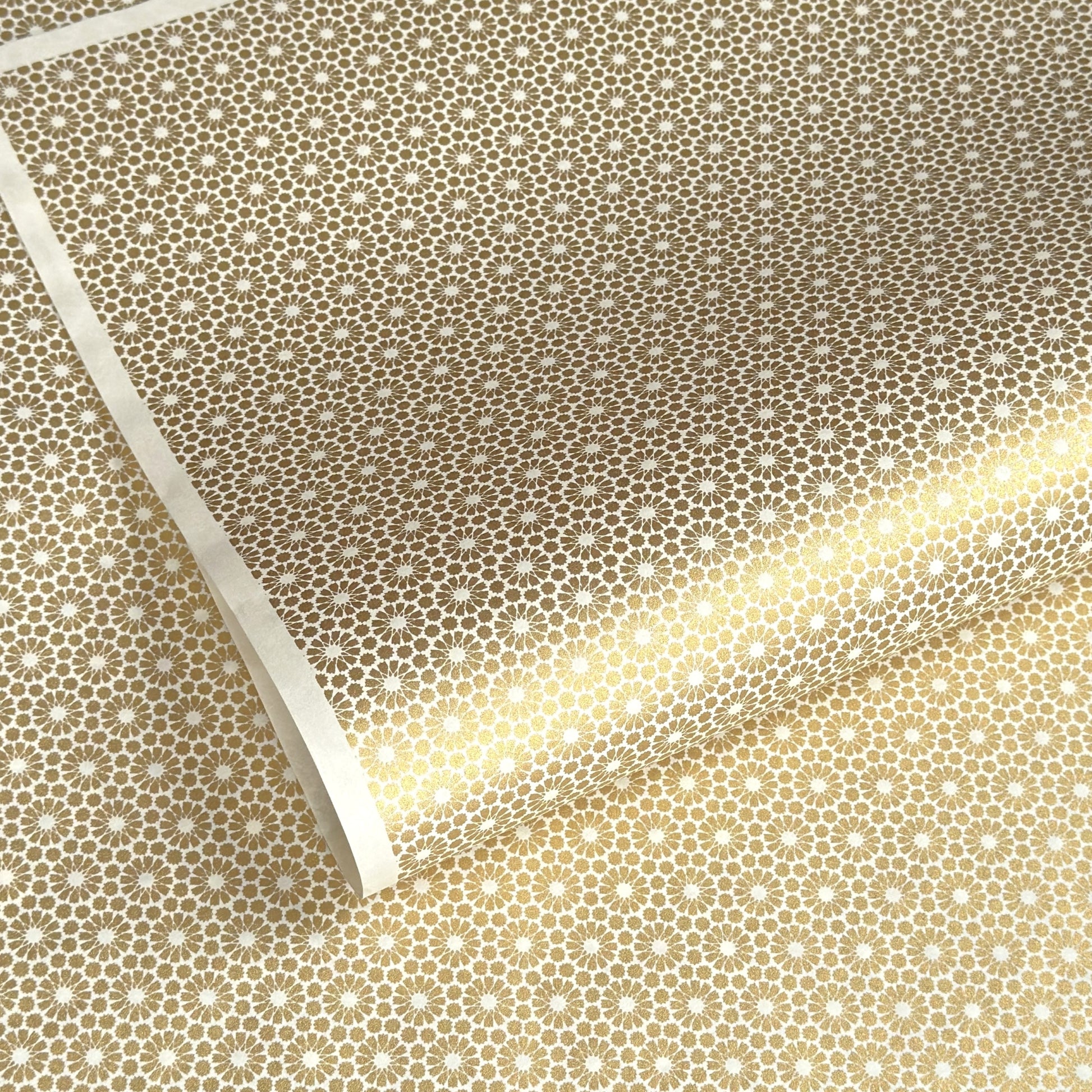 japanese silk-screen handmade paper showing gold repeat chrysanthemum flower motif repeat