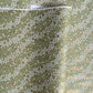 Waves of dainty white and gold flowers on a sage backdrop. Japanese chiyogami paper