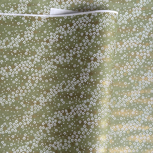 Waves of dainty white and gold flowers on a sage backdrop. Japanese chiyogami paper