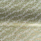 Waves of dainty white and gold flowers on a sage backdrop. Japanese chiyogami paper