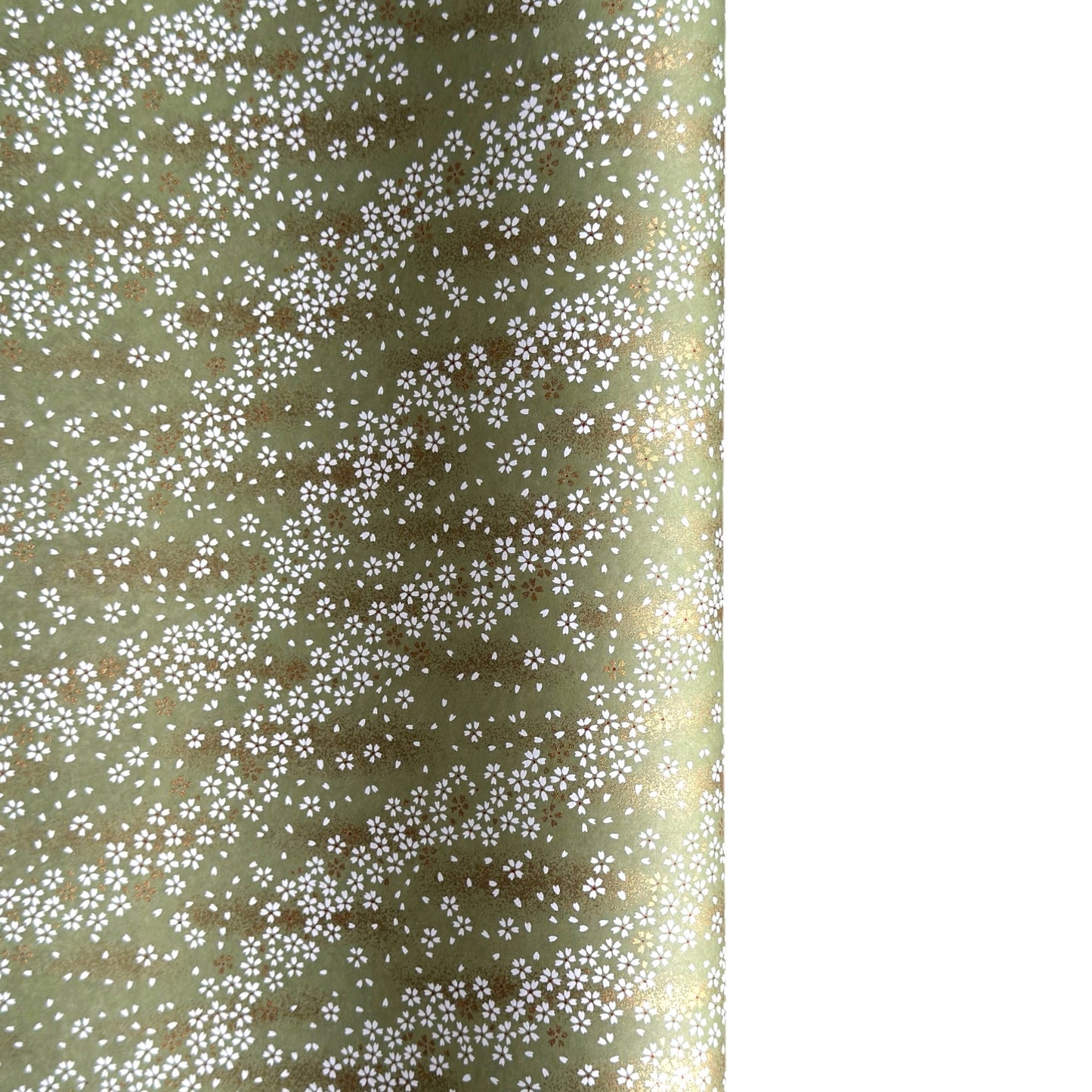 Waves of dainty white and gold flowers on a sage backdrop. Japanese chiyogami paper