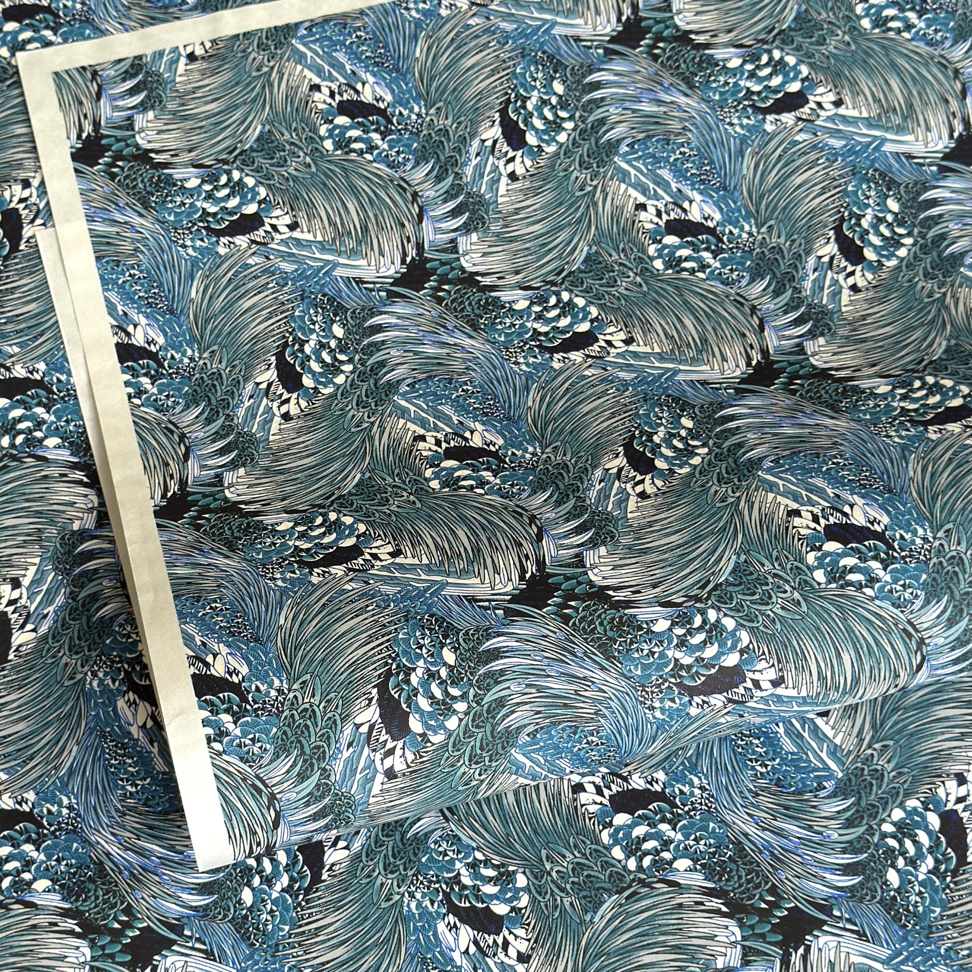 Detailed pattern of the plumage of feathers in tones of blue. Japanese chiyogami paper