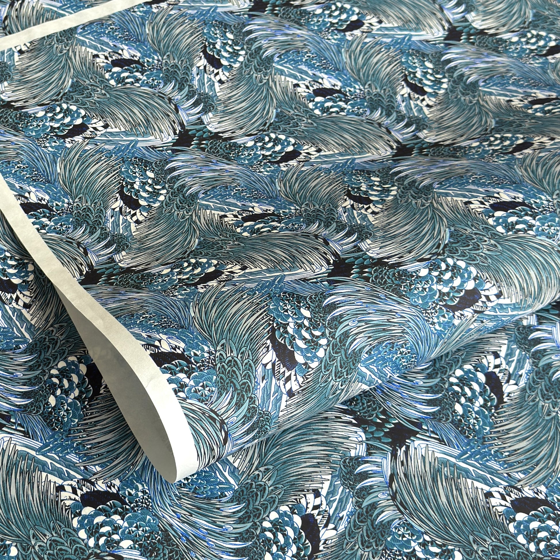 Detailed pattern of the plumage of feathers in tones of blue. Japanese chiyogami paper