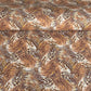 Detailed pattern of the plumage of feathers in brown, beige and ochre. Japanese chiyogami paper