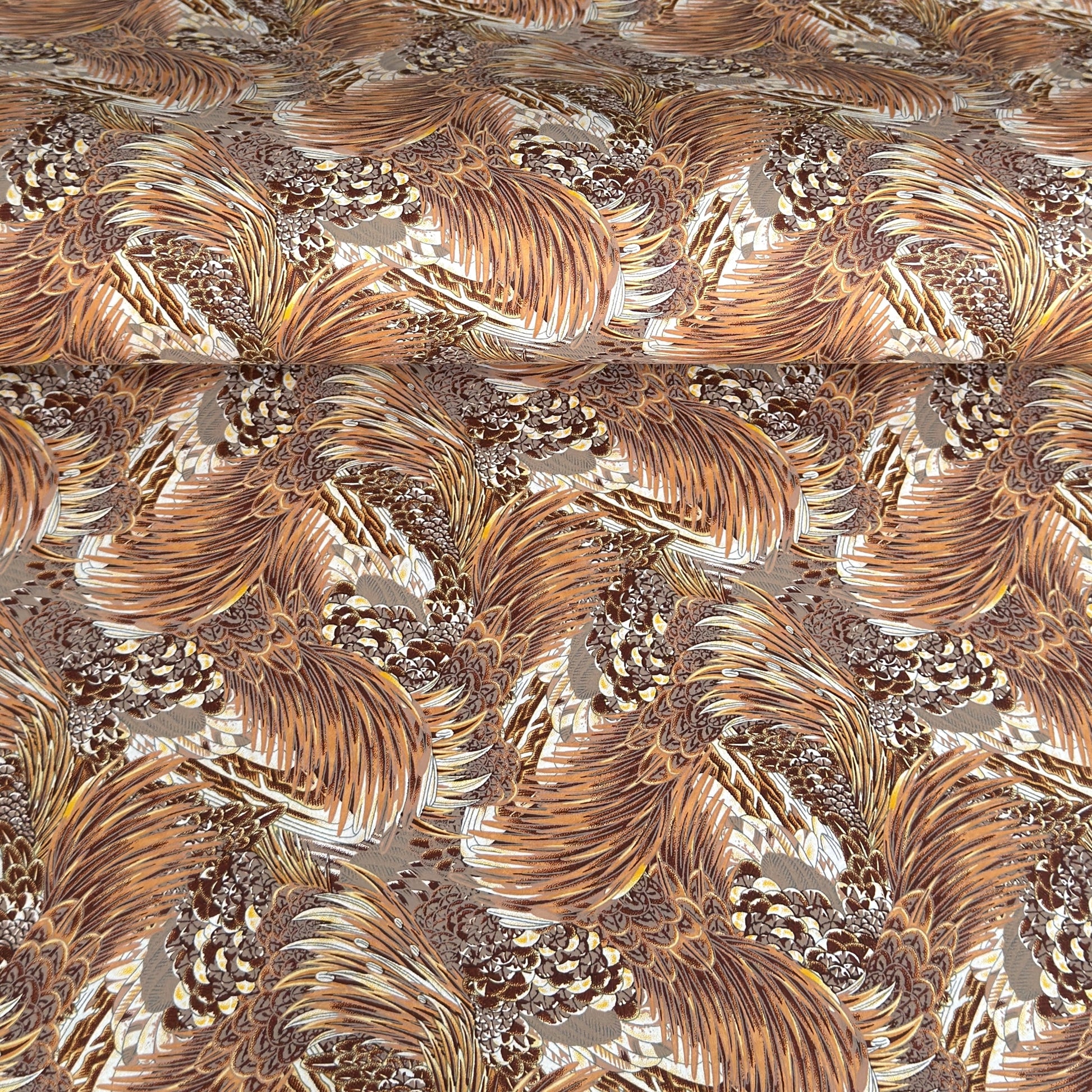 Detailed pattern of the plumage of feathers in brown, beige and ochre. Japanese chiyogami paper