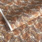 Detailed pattern of the plumage of feathers in brown, beige and ochre. Japanese chiyogami paper
