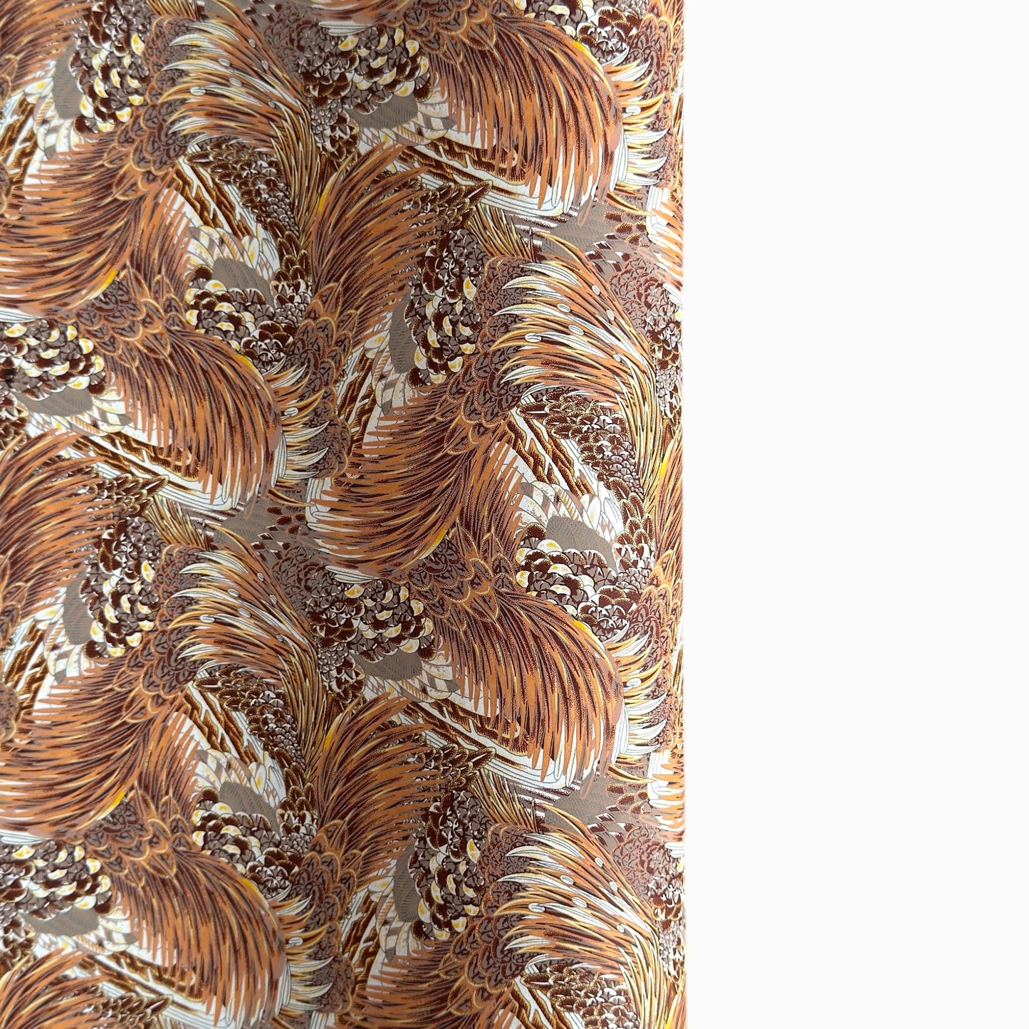 Detailed pattern of the plumage of feathers in brown, beige and ochre. Japanese chiyogami paper