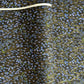 Gold rivers (kawa) with purple falling leaves (fukiyose) and foliage on a black backdrop. Japanese chiyogami paper