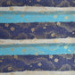 japanese chiyogami paper in stripes of blue, turquoise and grey with gold clouds and flowers