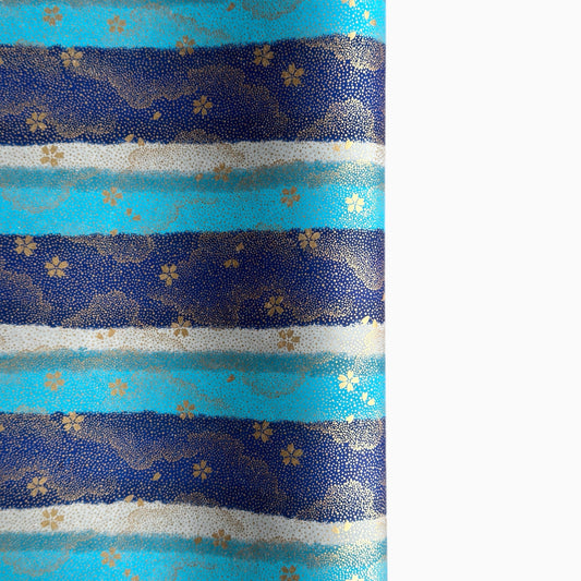 japanese chiyogami paper in stripes of blue, turquoise and grey with gold clouds and flowers