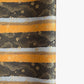 japanese chiyogami paper in stripes of black, brown, ochre and grey with gold clouds and flowers