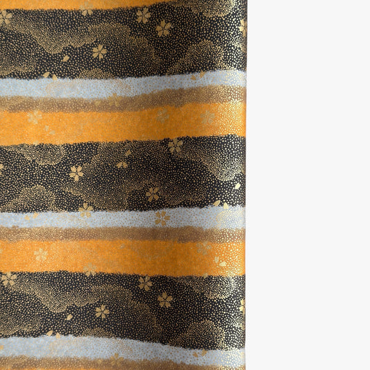 japanese chiyogami paper in stripes of black, brown, ochre and grey with gold clouds and flowers