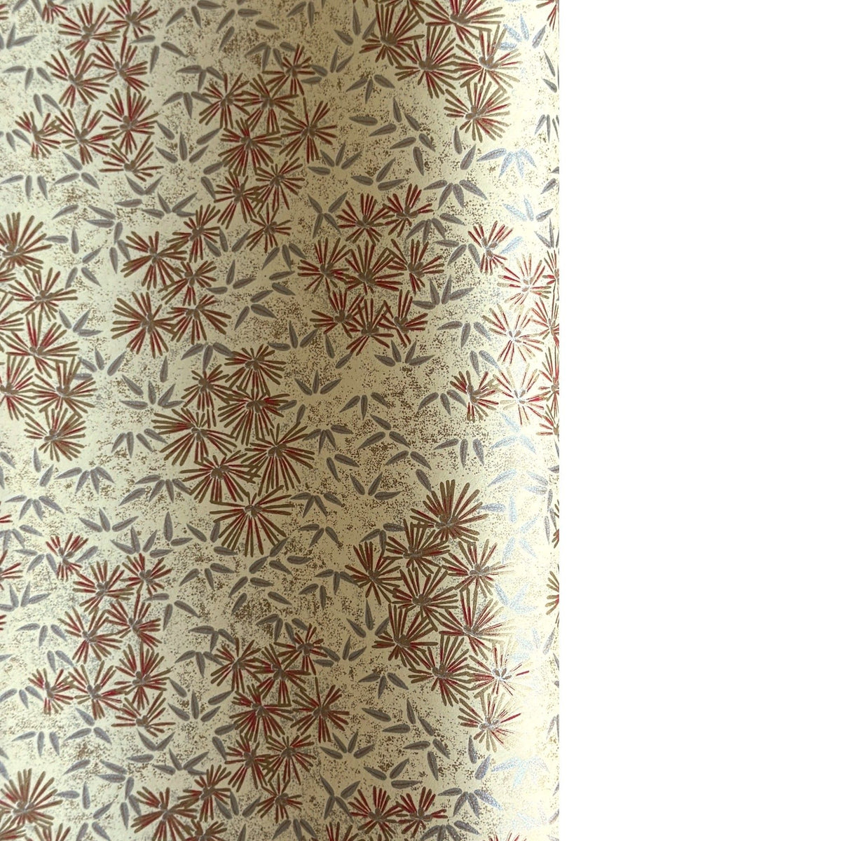 Pattern of scattered pine needles (matsuba) in gold and silver on a cream backdrop. Japanese chiyogami paper