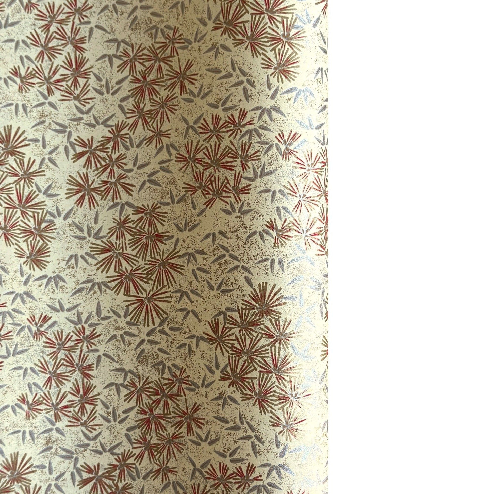 Pattern of scattered pine needles (matsuba) in gold and silver on a cream backdrop. Japanese chiyogami paper